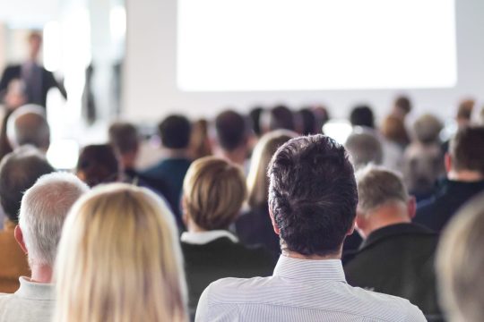 Speaker,Giving,A,Talk,At,Business,Meeting.,Audience,In,The